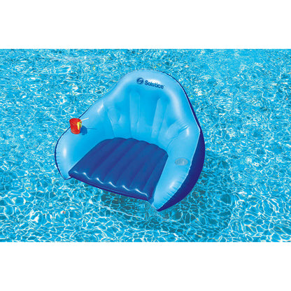 Solstice convertible pool chair floating in water with drink holder and mesh seat.