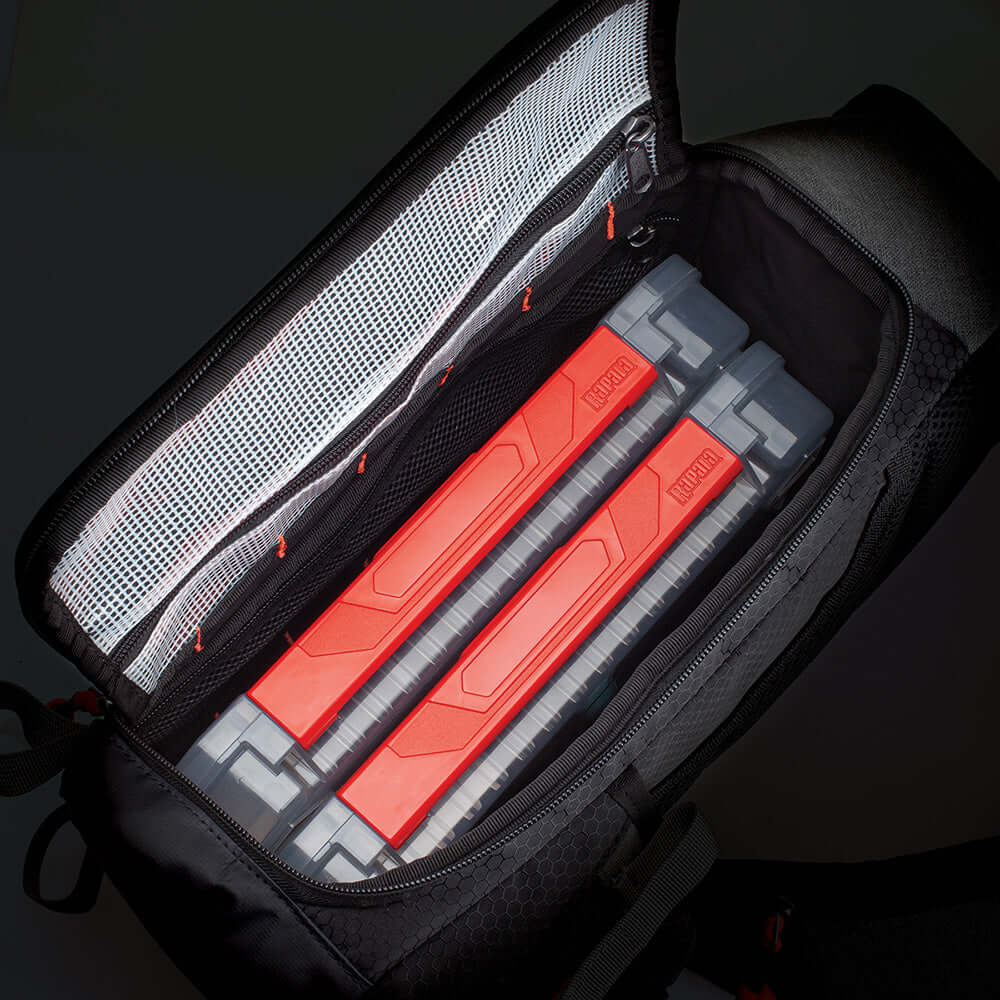 "Open Rapala Venture 8 Sling Pack showing organized fishing lure storage compartments."