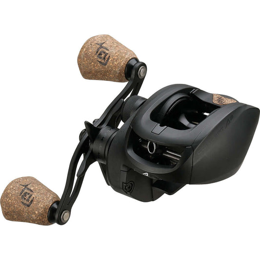 13 Fishing Concept A baitcast reel with cork handle grips and sleek black design.